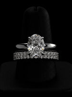 3.0CT Oval-Cut Moissanite · Hidden Halo Solitaire · 3.5mm Band · Double-Row Pavé Band · Sterling Silver / White Gold