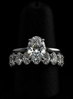 3.0CT Oval-Cut Moissanite · Hidden Halo Solitaire · Full Oval-Cut Eternity Band · Sterling Silver / White Gold