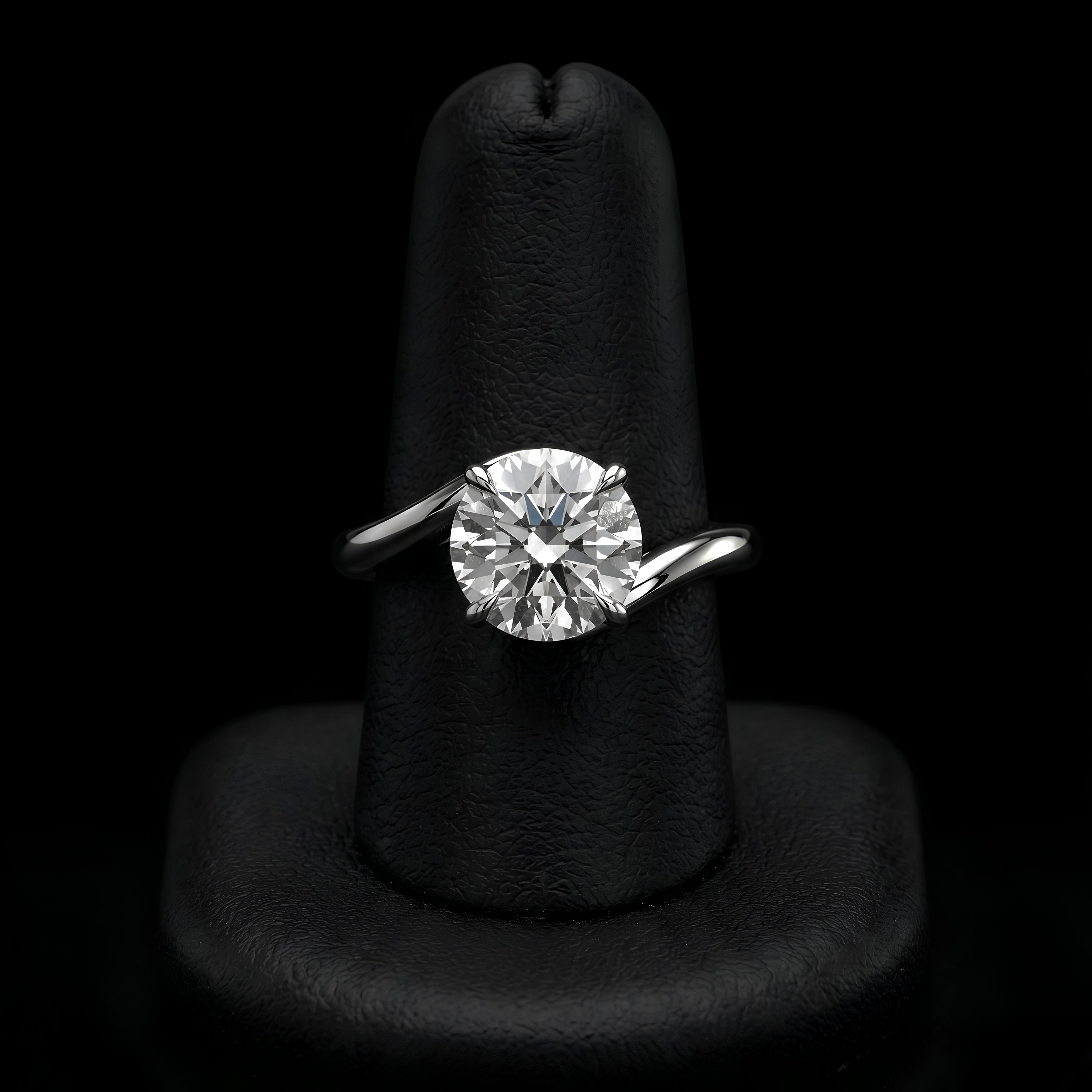 The Infinity Twist Solitaire Ring in Sterling Silver