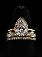 4.0CT Pear-Cut Moissanite · Hidden Halo Bezel Solitaire · Double Pavé Bridal Stack · Yellow Gold