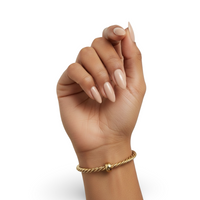 Eterna Twist Bangle — 9K Yellow Gold