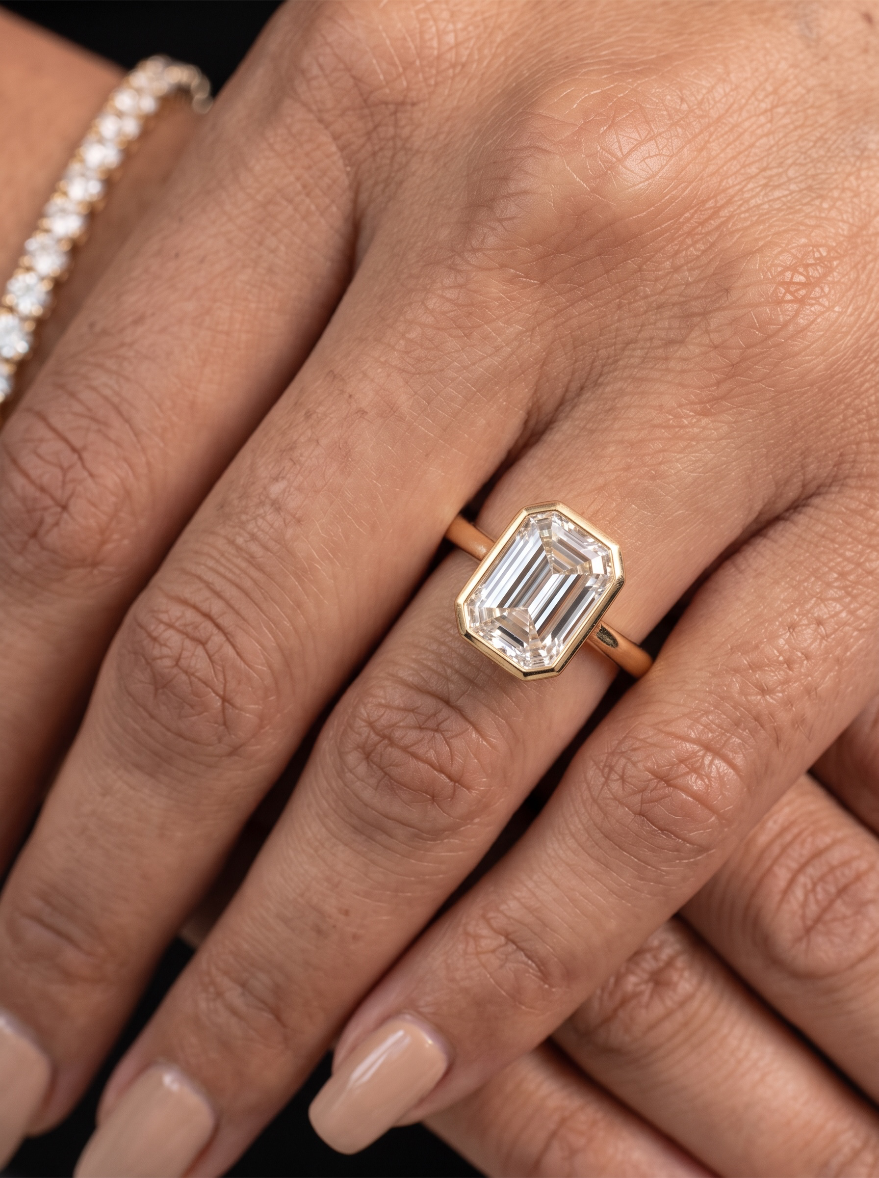 4.0ct Emerald Cut Bezel Ring in 9-18K Yellow Gold