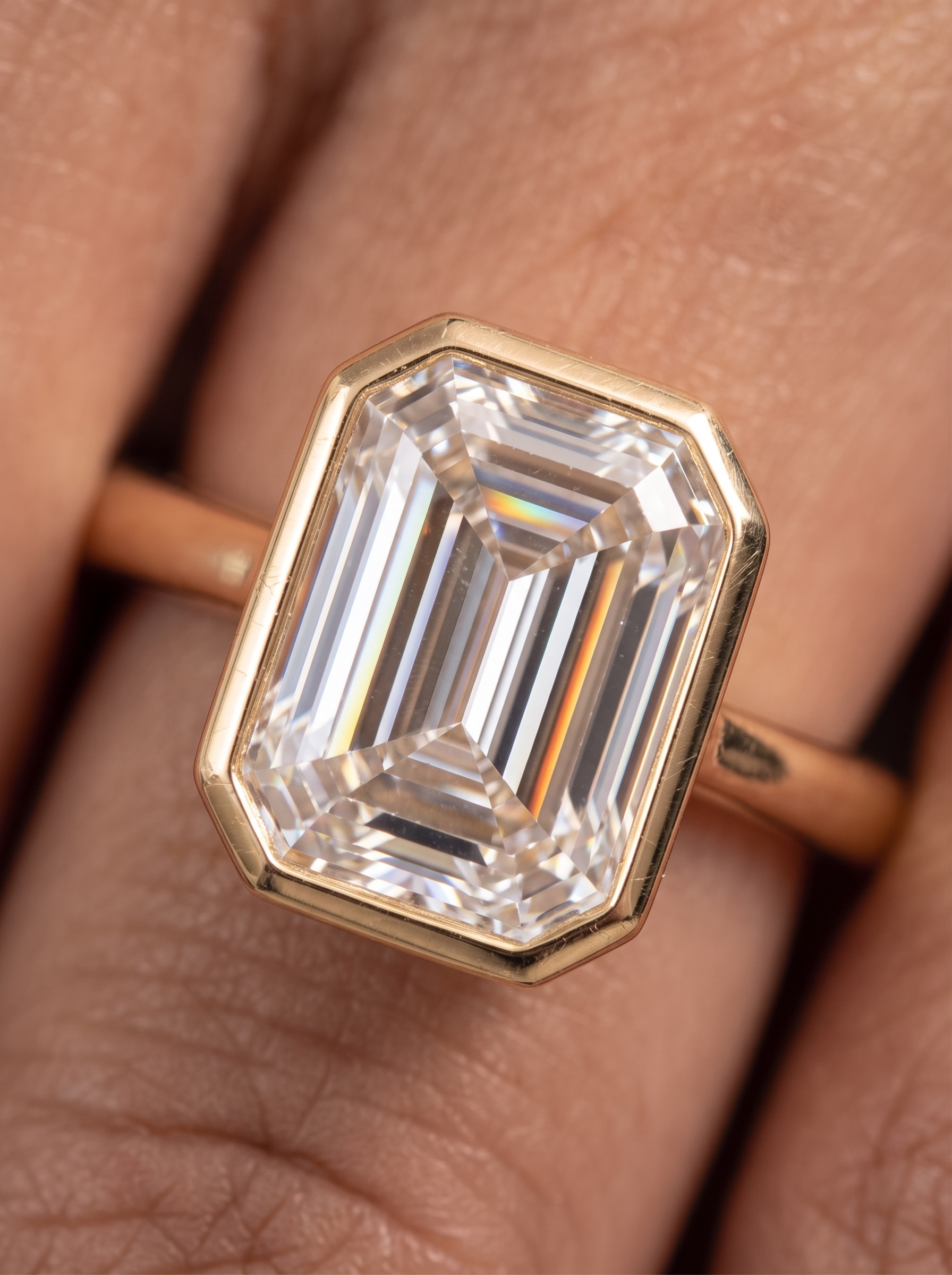 4.0ct Emerald Cut Bezel Ring in 9-18K Yellow Gold