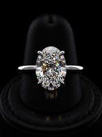 3.0ct Oval Moissanite Solitaire | Hidden Halo & Cathedral Setting