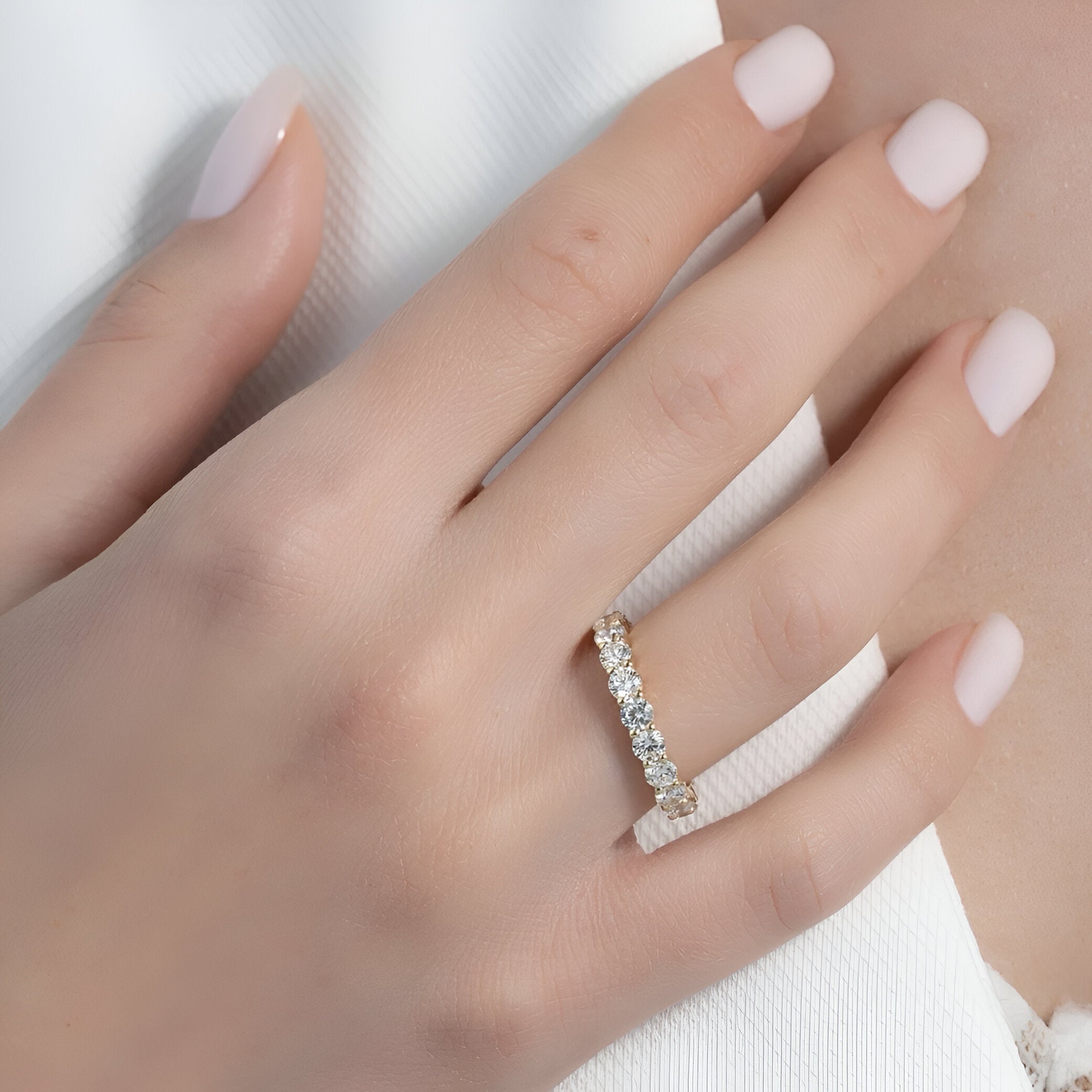 The Infinite Grace™ Round Cut Moissanite Eternity Band