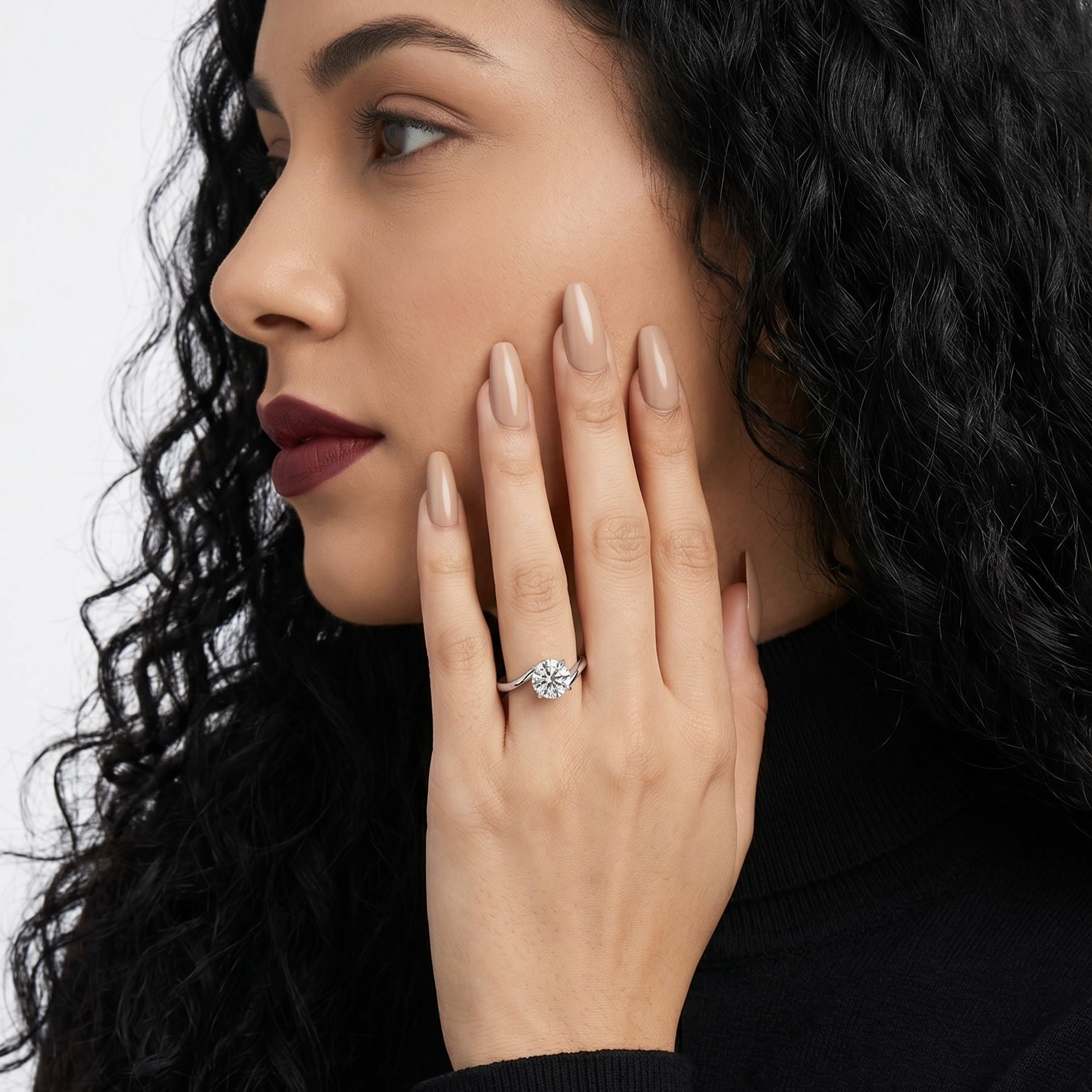 The Infinity Twist Solitaire Ring in Sterling Silver