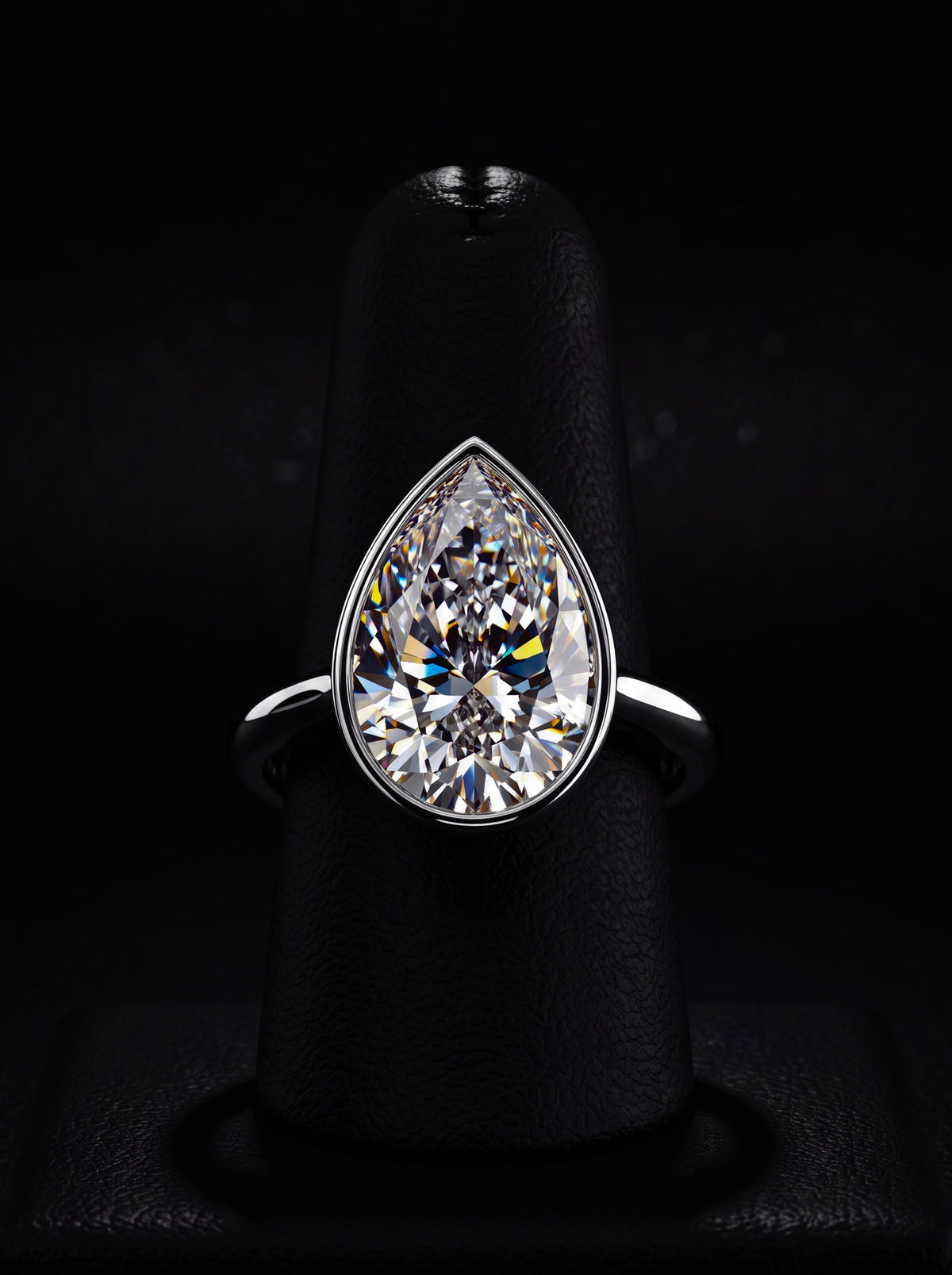 2.0ct Pear Cut Bezel Set Engagement Ring – Sterling Silver / 9K–14K White Gold MG ESSENCE